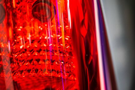 abstract blurred Close up Color detail on the Rear front light of a carの写真素材