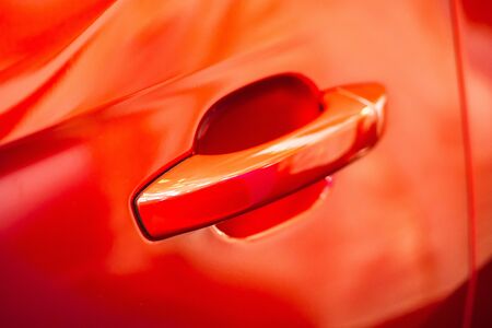 Red Car door handle Using wallpaper or backgroundの写真素材