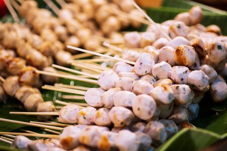 Meat ball , fish ball for grilled on wood stick ,Thai street food market