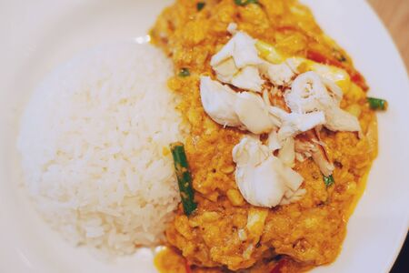 Stir fried crab with yellow curry powder And white riceの写真素材