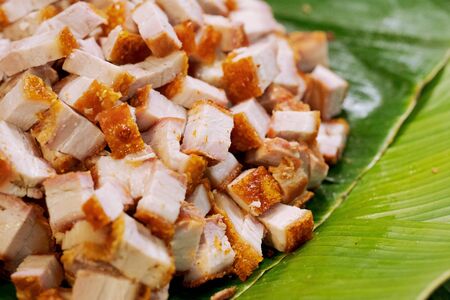 crispy pork belly or deep fried pork, thai street food marketの写真素材