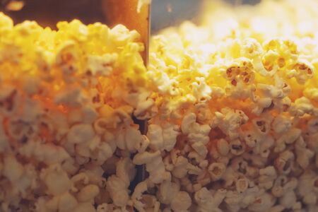 Close up of popcorn machine at the cinema texture backgroundの写真素材
