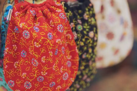Close up of Handicrafts embroidered bag with traditional pattern texture backgroundの写真素材