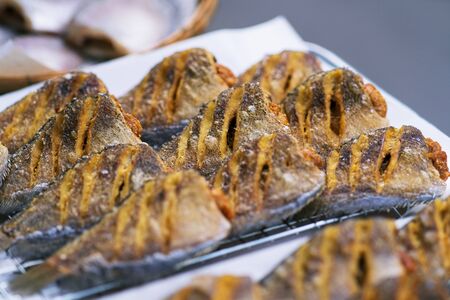 Close up of crispy gourami fish or Sepat Siam fish or Pla salid thai street food marketの写真素材