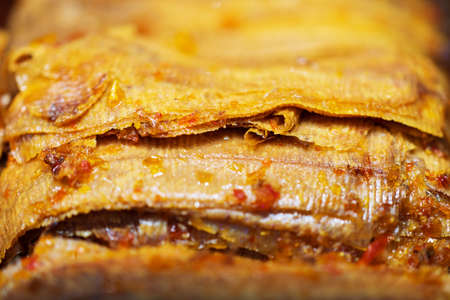 Close up of Dried squid with spicy and sweet sauce thai street food marketの写真素材