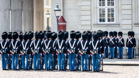 Copenhagen - May 9, 2013  Soldiers of the Danish Royal Life Guards line up for the changing of the guards on the central plaza of Amalienborg palace in Copenhagen, in May 2013 のeditorial素材