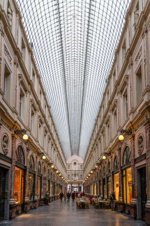 Brussels, Belgium - March 2013: View down Galeries Royales Saint-Hubert in Brussels on March 31, 2013. The gallery is one of the oldest shopping malls in the world.のeditorial素材