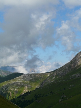 Summer paragliding in alps mountains - Italyの写真素材