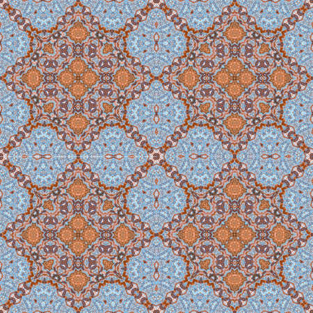 Colorful vintage ornamented ceramic tiles wall decoration in turquiose and golden.