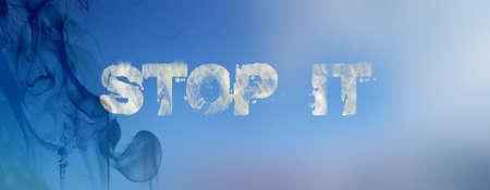 Stop it lwords written in blue sky by white cloudy letters with black smoke in the left. Stop...