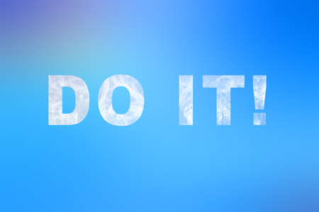 Do it words white letters made out of ccluffy clouds on blue sky nature background. Inspirational...