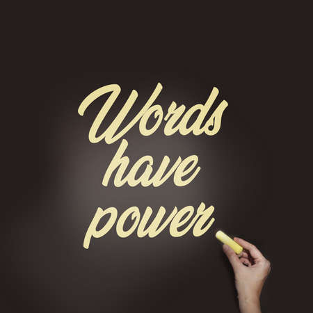 words have power written with woman's hand on blackboard. Copyrighting piar massmedia or communication concept .の写真素材