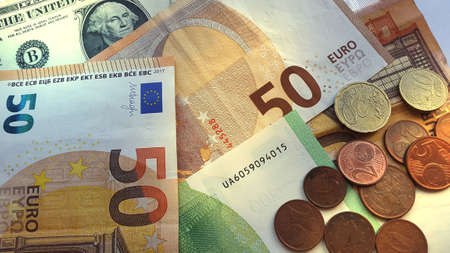 Fifty and hundred euro bills and coins. Money finance concept..