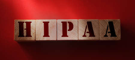 Wooden block form the word HIPAA Health Insurance Portability and Accountability Act. Medical concept.の写真素材