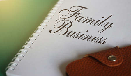 Family Business on notebook with wallet Small business enterprice unit startup development concept.