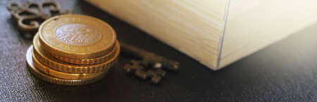 a coin pile over a keyboard and wooden box. Saving money concept, online trading internet business earning via web concept. wide banner.の写真素材