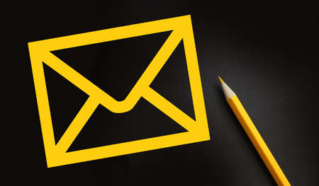 Letter Email Post Icon and yellow pencil besides. Contact us concept.