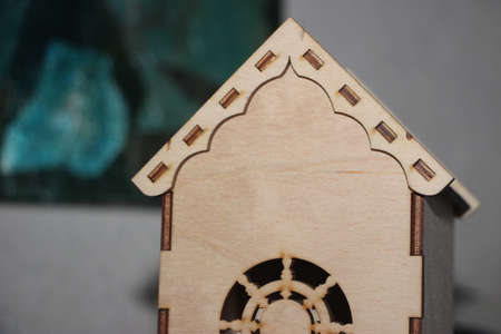 Miniature toy wooden house. Real estate buying or renting planning concept.の写真素材
