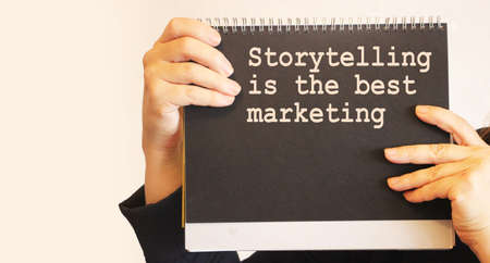 sentence Storytelling is the best Marketing, black notebook. Motivation quote.の写真素材