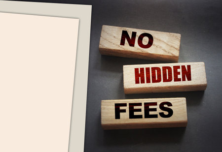 No hidden fees word written on wooden blocks. Taxes and fees optimization Financial business...