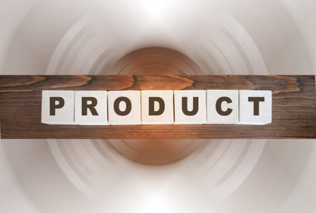Product word written on wood block. Cube wooden block with alphabet combine the word Product on wooden background. Business and trading conceptの写真素材