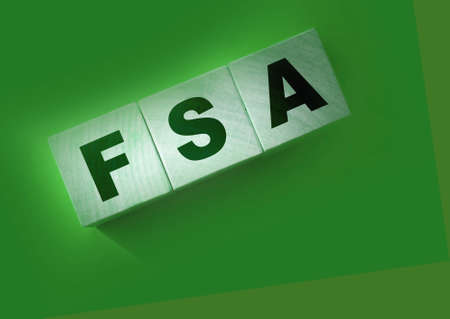 FSA abbreviation on red background. Flexible Spending Account financial concept.の写真素材