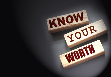 Know Your Worth on wooden blocks. Self motivation coaching HR conceptの写真素材