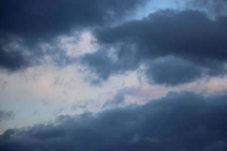 Dark ominous clouds. Dramatic sky background.