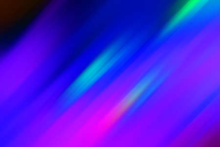 Futuristic glowing neon blue purple pink green abstract background for holiday. Unfocused night city...