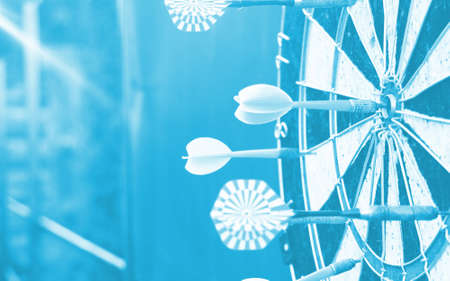 Darts target closeup. Success hitting target aim goal achievement concept.