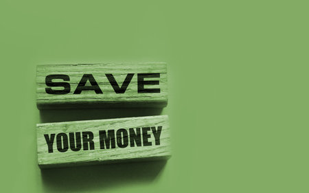 Wooden blocks twith ext Save Your Money. Business and finance concept.の写真素材