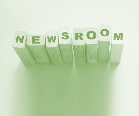 NEWSROOM word made with wooden building blocks.の写真素材