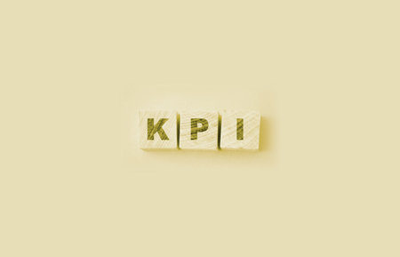 KPI Word Written In Wooden Cubes,Key Performance Indicator. Business concept.