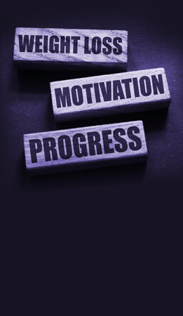 Weight loss motivation progress words on wooden blocks with copyspace. Successful diet plan healthy food weightloss conceptの写真素材