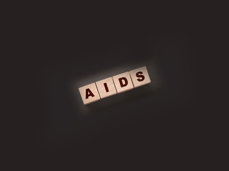 AIDS letters on wooden cubes. STD sexually transmitted diseasesの写真素材