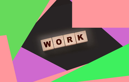 Inscription on wooden cubes Work on black The concept of working from homeの写真素材