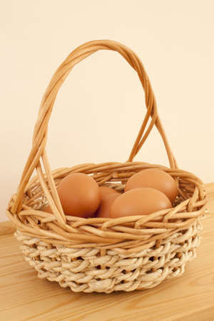 Boiled eggs in wicker basketの写真素材