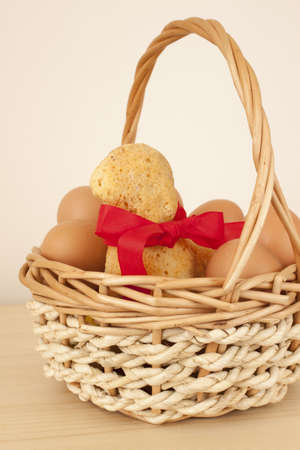 Basket with eggs and a lamb cake の写真素材