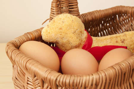 Basket with eggs and a lamb cake の写真素材