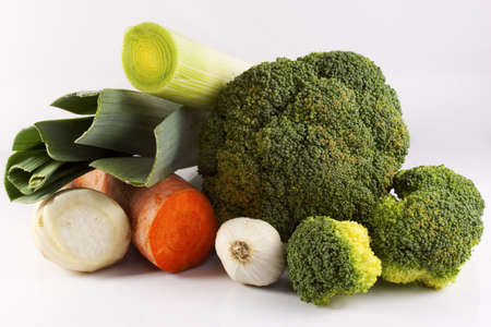 Carrot, parsley, broccoli and leeks on a white backgroundの写真素材