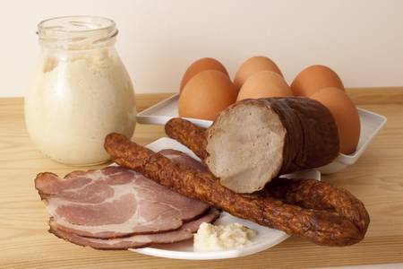 Few kind of sausages, eggs and horseradish 