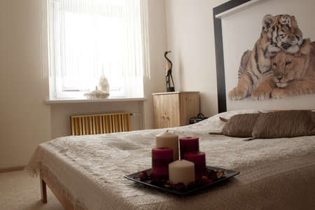 Romantic bedroom with candlesの写真素材