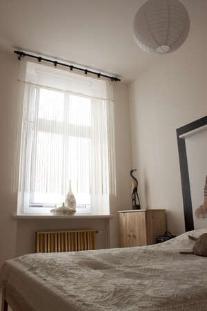 Small nice bedroom with double bed の写真素材