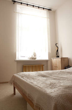Modern white bedroom with big bedの写真素材