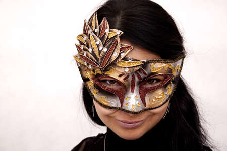 Smiled woman with venetian maskの写真素材