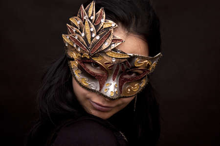 Young woman in carnival maskの写真素材