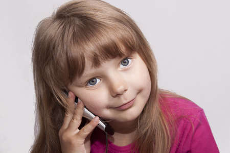 A pretty girl with a mobile phoneの写真素材
