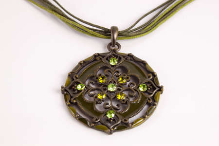 Green necklace on a white backgroundの写真素材