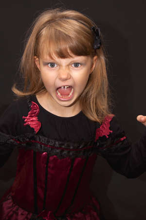 Predatory girl in black for Halloweenの写真素材