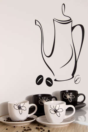 Cup of coffee from the kitchen wall sticker in the backgroundの写真素材